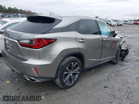 2019 Lexus RX with VIN 2T2ZZMCA8KC150189, listed as a IAAI auction lot 41063253 with 81,000 mi miles. Bid and sale history available at carsss.com. Image 4.