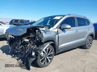 2024 Volkswagen Taos SE z VIN 3VVEX7B21RM001601, wystawiony jako IAAI lot #41406215 z przebiegiem 8 557 mil mil oraz . Historia ofert i sprzedaży dostępna na DreamBid. Obrazek 6.