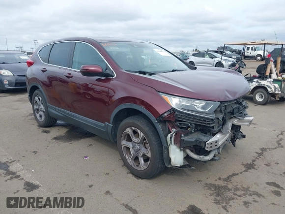 2019 Honda CR-V EX with VIN 7FARW2H56KE053022, listed as a IAAI auction lot 41848570 with 128,676 mi miles. Bid and sale history available at carsss.com. Image 1.
