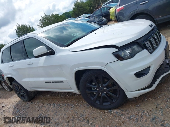 2019 Jeep Grand Cherokee Altitude z VIN 1C4RJEAG7KC533316, wystawiony jako IAAI lot #42471064 z przebiegiem 142 299 mil mil oraz . Historia ofert i sprzedaży dostępna na DreamBid. Obrazek 13.