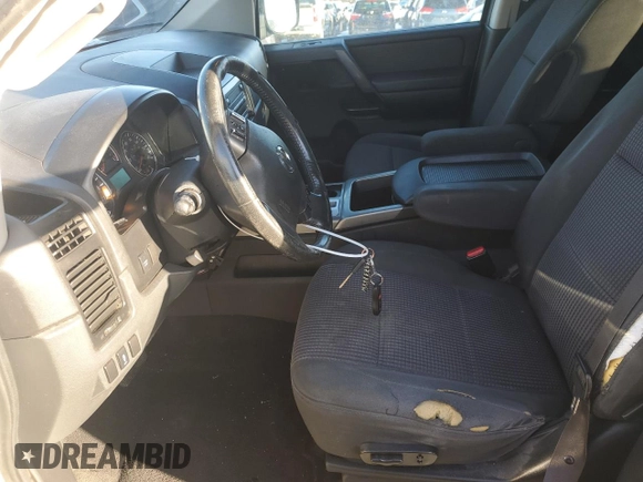 2012 Nissan Titan SV with VIN 1N6AA0EC1CN326088, listed as a Copart auction lot 42799335 with 163,218 mi miles and Salvage Title. Bid and sale history available at carsss.com. Image 7.