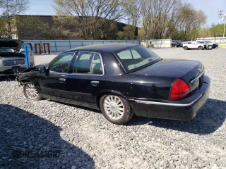 2010 Mercury Grand Marquis LS z VIN 2MEBM7FV8AX618001, wystawiony jako Copart lot #55382305 z przebiegiem 209 814 mil mil oraz Tytuł czysty. Historia ofert i sprzedaży dostępna na DreamBid. Obrazek 2.