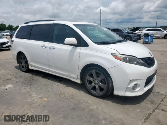 2017 Toyota Sienna SE with VIN 5TDXZ3DC9HS821990, listed as a Copart auction lot 60912365 with 182,672 mi miles and Salvage title. Bid and sale history available at DreamBid. Image 4.