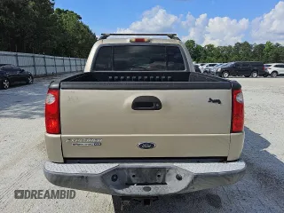 2004 Ford Explorer Sport Trac XLS z VIN 1FMZU77K64UA90633, wystawiony jako Copart lot #54862215 z przebiegiem 274 354 mil mil oraz Czysty tytuł • Clean title. Historia ofert i sprzedaży dostępna na DreamBid. Obrazek 6.