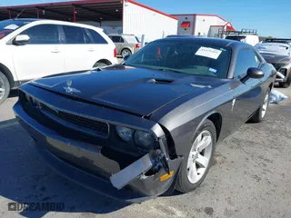 2013 Dodge Challenger Rallye Redline with VIN 2C3CDYAG8DH578929, listed as a IAAI auction lot 41479265 with 138,098 mi miles. Bid and sale history available at carsss.com. Image 2.