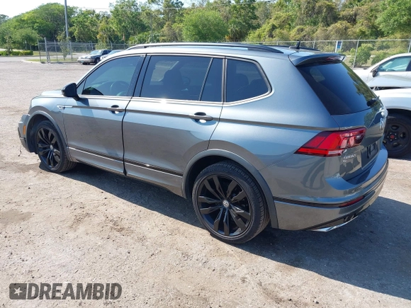 2020 Volkswagen Tiguan SE with VIN 3VV3B7AX3LM176300, listed as a IAAI auction lot 42004744 with 86,074 mi miles and . Bid and sale history available at DreamBid. Image 3.