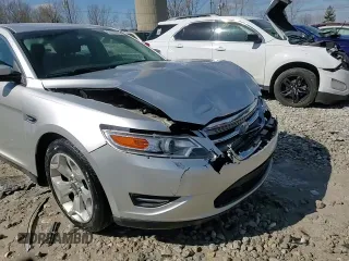2012 Ford Taurus SEL z VIN 1FAHP2HW7CG138459, wystawiony jako Copart lot #53170075 z przebiegiem 194 617 mil mil oraz Czysty tytuł • Clean title. Historia ofert i sprzedaży dostępna na DreamBid. Obrazek 13.