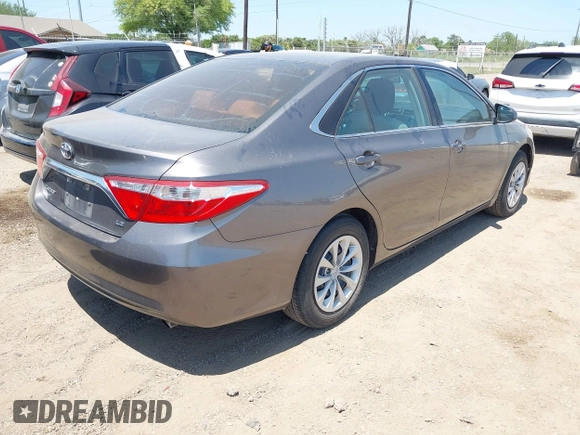 2016 Toyota Camry XLE with VIN 4T4BF1FK4GR581867, listed as a IAAI auction lot 42002126 with 74,811 mi miles. Bid and sale history available at carsss.com. Image 4.