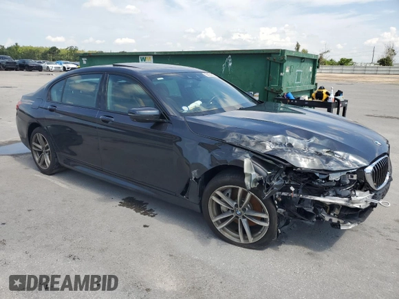 2017 BMW 7 Series 740i with VIN WBA7E2C53HG739365, listed as a Copart auction lot 58234325 with Not provided miles and Salvage title. Bid and sale history available at DreamBid. Image 4.