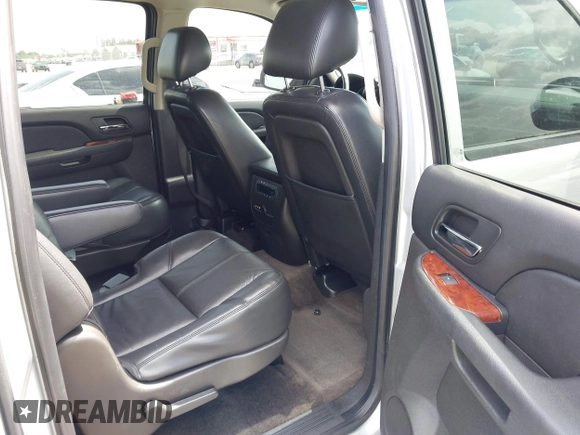 2013 Chevrolet Suburban LT with VIN 1GNSCJE08DR378459, listed as a IAAI auction lot 42453650 with 179,156 mi miles and . Bid and sale history available at DreamBid. Image 8.