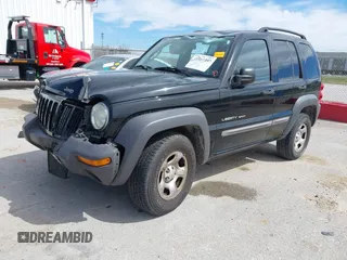 2003 Jeep Liberty Sport with VIN 1J4GL48KX3W530569, listed as a IAAI auction lot 41857397 with 172,303 mi miles. Bid and sale history available at carsss.com. Image 17.