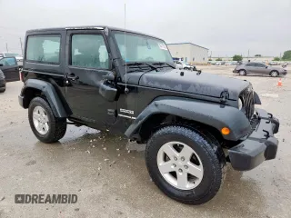 2014 Jeep Wrangler Sport with VIN 1C4AJWAG9EL261147, listed as a Copart auction lot 59417335 with 133,835 mi miles and Salvage title. Bid and sale history available at DreamBid. Image 4.