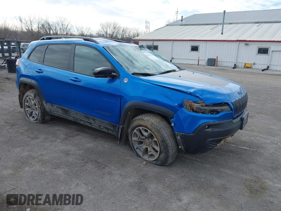 2022 Jeep Cherokee Trailhawk z VIN 1C4PJMBX1ND539319, wystawiony jako IAAI lot #41811178 z przebiegiem 49 922 mil mil oraz . Historia ofert i sprzedaży dostępna na DreamBid. Obrazek 1.