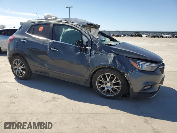 2018 Buick Encore Sport Touring with VIN KL4CJ1SB0JB519791, listed as a Copart auction lot 47523755 with Not Provided miles and Salvage Title. Bid and sale history available at DreamBid. Image 4.