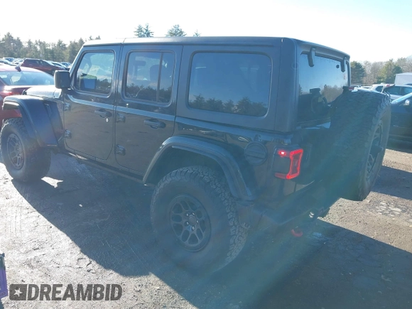 2023 Jeep Wrangler Rubicon with VIN 1C4JJXFGXPW682231, listed as a IAAI auction lot 41110264 with 15,147 mi miles and . Bid and sale history available at DreamBid. Image 3.