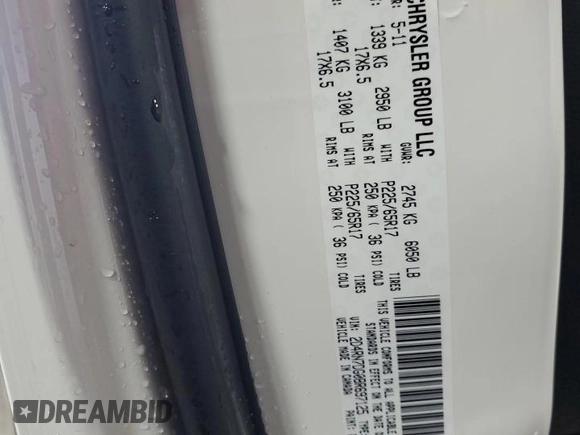 2011 Dodge Grand Caravan R/T with VIN 2D4RN7DG0BR697125, listed as a Copart auction lot 66491484 with 92,987 mi miles and Salvage Title. Bid and sale history available at DreamBid. Image 13.