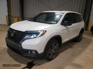 2021 Honda Passport EX-L with VIN 5FNYF8H5XMB020506, listed as a Copart auction lot 50731593 with 30,847 mi miles. Bid and sale history available at carsss.com. Image 1.