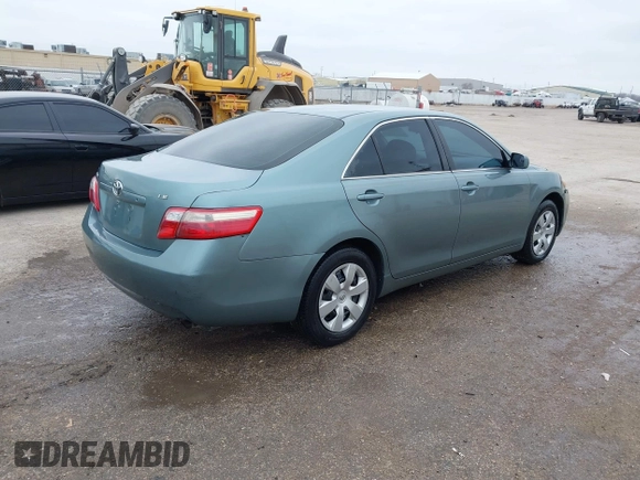 2007 Toyota Camry CE with VIN 4T1BE46KX7U651838, listed as a IAAI auction lot 41660130 with 191,619 mi miles. Bid and sale history available at carsss.com. Image 4.