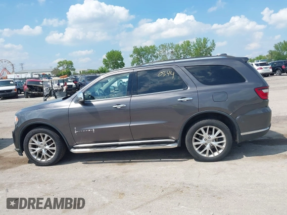 2014 Dodge Durango Citadel with VIN 1C4RDJEG0EC978611, listed as a IAAI auction lot 42250344 with 200,412 mi miles and . Bid and sale history available at DreamBid. Image 15.