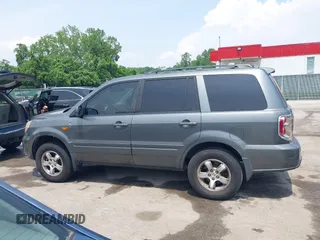 2007 Honda Pilot EX-L z VIN 5FNYF18517B001550, wystawiony jako IAAI lot #42263555 z przebiegiem 246 317 mil mil oraz . Historia ofert i sprzedaży dostępna na DreamBid. Obrazek 14.