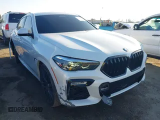 2021 BMW X6 sDrive40i z VIN 5UXCY4C06M9E16162, wystawiony jako IAAI lot #41279040 z przebiegiem 94 494 mil mil oraz . Historia ofert i sprzedaży dostępna na DreamBid. Obrazek 1.