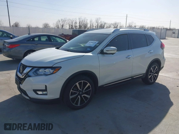 2018 Nissan Rogue SV with VIN JN8AT2MT4JW487069, listed as a IAAI auction lot 41704570 with 98,360 mi miles and . Bid and sale history available at carsss.com. Image 17.