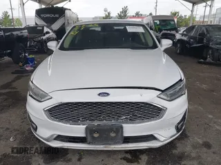 2019 Ford Fusion Titanium with VIN 3FA6P0K90KR236674, listed as a IAAI auction lot 42008633 with 99,737 mi miles and . Bid and sale history available at DreamBid. Image 12.