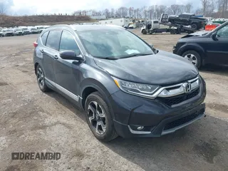 2019 Honda CR-V Touring with VIN 2HKRW2H9XKH636354, listed as a IAAI auction lot 41902615 with 66,781 mi miles. Bid and sale history available at carsss.com. Image 1.
