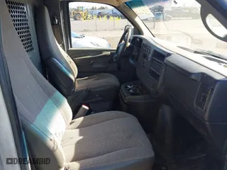 2012 Chevrolet Express Cargo Van with VIN 1GCWGFBA4C1201669, listed as a IAAI auction lot 41831558 with 267,255 mi miles. Bid and sale history available at carsss.com. Image 5.