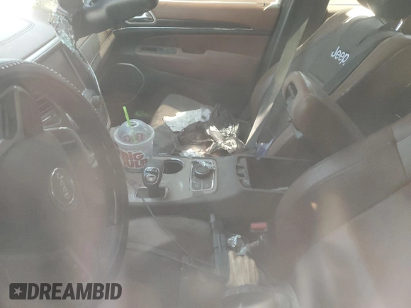 2015 Jeep Grand Cherokee Summit с VIN 1C4RJFJT5FC796820, выставлен на аукционе Copart как лот 49226795 с пробегом Не указан миль и Списание • Salvage title. История ставок и продаж доступна на DreamBid. Изображение 7.