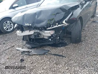 2023 Kia K5 GT-Line z VIN 5XXG64J20PG213348, wystawiony jako IAAI lot #42333459 z przebiegiem 34 392 mil mil oraz . Historia ofert i sprzedaży dostępna na DreamBid. Obrazek 6.