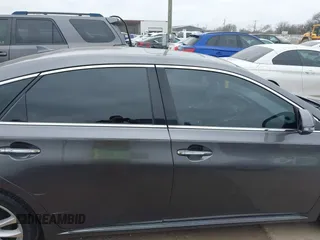 2015 Toyota Avalon Limited with VIN 4T1BK1EB4FU167011, listed as a IAAI auction lot 41582722 with 77,314 mi miles and . Bid and sale history available at DreamBid. Image 13.