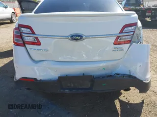 2016 Ford Taurus SEL with VIN 1FAHP2E84GG102031, listed as a IAAI auction lot 40597227 with 167,410 mi miles and . Bid and sale history available at DreamBid. Image 6.