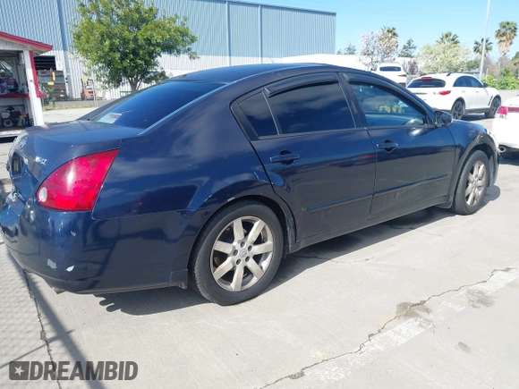 2004 Nissan Maxima SL with VIN 1N4BA41E64C861846, listed as a IAAI auction lot 41911687 with 218,668 mi miles. Bid and sale history available at carsss.com. Image 4.