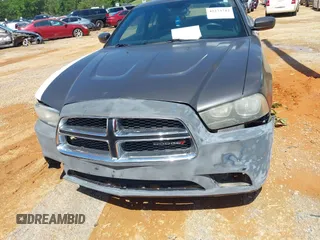2014 Dodge Charger SE z VIN 2C3CDXBG5EH315467, wystawiony jako IAAI lot #42273742 z przebiegiem 153 493 mil mil oraz . Historia ofert i sprzedaży dostępna na DreamBid. Obrazek 12.