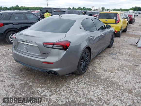 2021 Maserati Ghibli S Q4 with VIN ZAM57YTA8M1368703, listed as a IAAI auction lot 42170551 with 29,969 mi miles and . Bid and sale history available at DreamBid. Image 4.