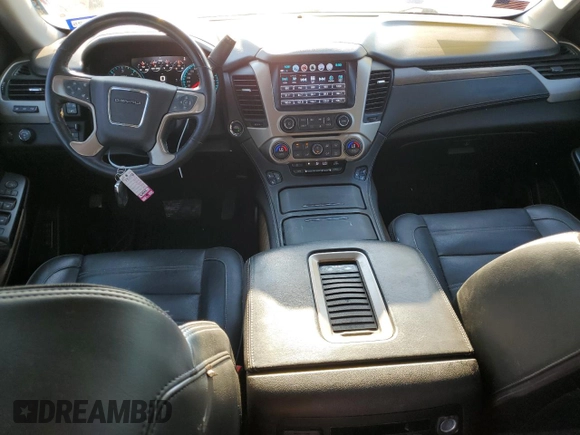 2019 GMC Yukon Denali with VIN 1GKS1CKJ9KR134571, listed as a Copart auction lot 73275664 with 50,853 mi miles and Salvage Title. Bid and sale history available at carsss.com. Image 8.