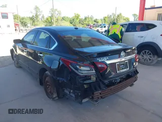 2018 Nissan Altima SV with VIN 1N4AL3APXJC297759, listed as a IAAI auction lot 41758613 with 77,527 mi miles and . Bid and sale history available at carsss.com. Image 3.