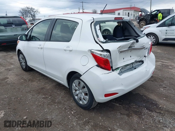 2014 Toyota Yaris L with VIN JTDKTUD34ED589582, listed as a IAAI auction lot 41538884 with 87,798 mi miles. Bid and sale history available at carsss.com. Image 3.