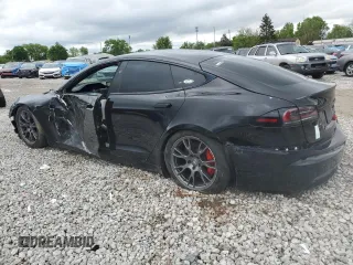 2023 Tesla Model S Plaid with VIN 5YJSA1E67PF511354, listed as a Copart auction lot 56648975 with 69,002 mi miles and Salvage title. Bid and sale history available at DreamBid. Image 2.