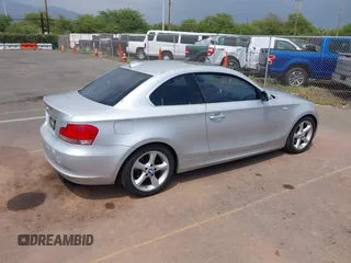 2009 BMW 1 Series 128i with VIN WBAUP73549VK75378, listed as a IAAI auction lot 41872843 with 77,985 mi miles and . Bid and sale history available at carsss.com. Image 4.