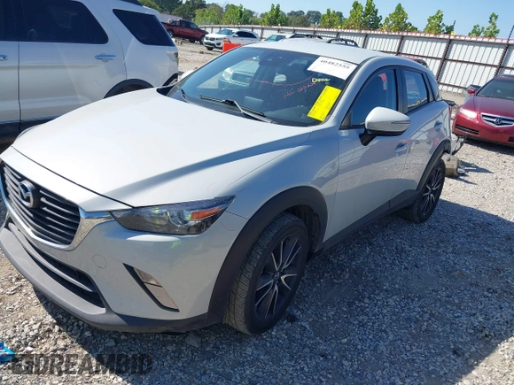 2018 Mazda CX-3 Touring z VIN JM1DKFC77J0331828, wystawiony jako IAAI lot #40482555 z przebiegiem 101 473 mil mil oraz . Historia ofert i sprzedaży dostępna na DreamBid. Obrazek 18.