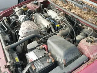 1998 Toyota Camry LE z VIN 4T1BG22K9WU382654, wystawiony jako IAAI lot #43324515 z przebiegiem 203 855 mil mil oraz . Historia ofert i sprzedaży dostępna na DreamBid. Obrazek 12.