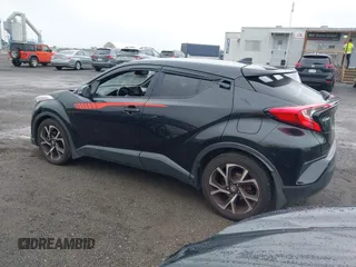2018 Toyota C-HR XLE with VIN JTNKHMBX6J1000904, listed as a IAAI auction lot 42513117 with 77,192 mi miles and . Bid and sale history available at DreamBid. Image 3.