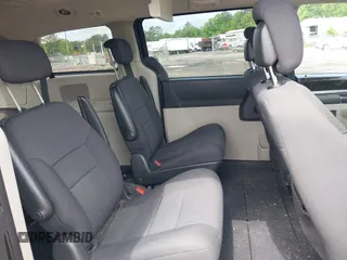 2010 Dodge Grand Caravan SXT with VIN 2D4RN5D11AR459864, listed as a IAAI auction lot 42197818 with 149,553 mi miles and . Bid and sale history available at DreamBid. Image 8.