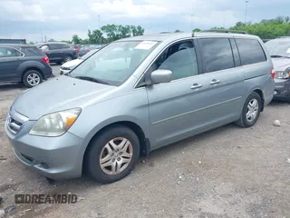 2007 Honda Odyssey EX-L with VIN 5FNRL38627B055862, listed as a IAAI auction lot 42148442 with 225,627 mi miles. Bid and sale history available at carsss.com. Image 2.