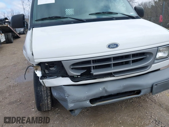 2000 Ford Econoline Cargo with VIN 1FTRE14W2YHB25933, listed as a IAAI auction lot 41912248 with 57,561 mi miles. Bid and sale history available at carsss.com. Image 12.