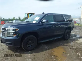 2019 Chevrolet Tahoe Commercial z VIN 1GNLCDEC1KR218436, wystawiony jako IAAI lot #42286365 z przebiegiem 119 981 mil mil oraz . Historia ofert i sprzedaży dostępna na DreamBid. Obrazek 2.