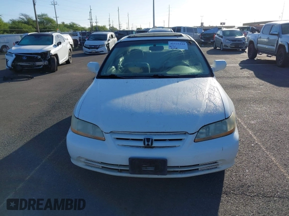 2002 Honda Accord EX z VIN 1HGCG16522A024557, wystawiony jako IAAI lot #41525344 z przebiegiem 219 786 mil mil oraz . Historia ofert i sprzedaży dostępna na DreamBid. Obrazek 6.
