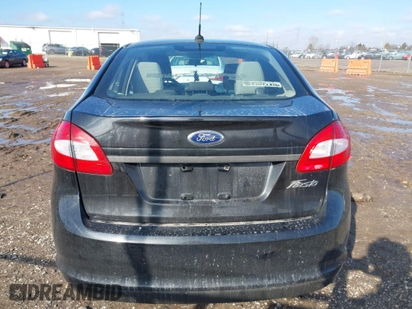 2013 Ford Fiesta S z VIN 3FADP4AJ2DM129703, wystawiony jako IAAI lot #41669041 z przebiegiem 138 831 mil mil oraz . Historia ofert i sprzedaży dostępna na DreamBid. Obrazek 16.